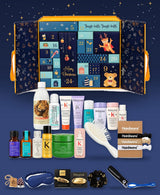 Matuschka Adventskalender mit Haarpflege-Produkten und Accessoires vor dem geöffneten Kalender