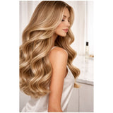 Seidiges, glänzendes Haar im seitlichen Profil mit sanften Wellen als Symbol für präzises GHD Chronos Styling