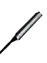 Peigne de coiffure culte pour des looks dansants et élégants